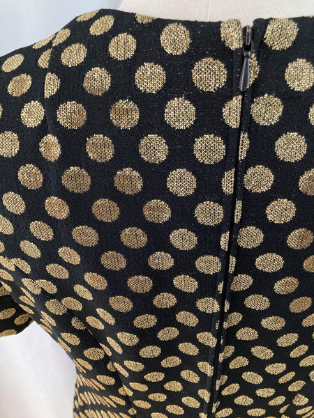 Robe noire motifs dorés années 70