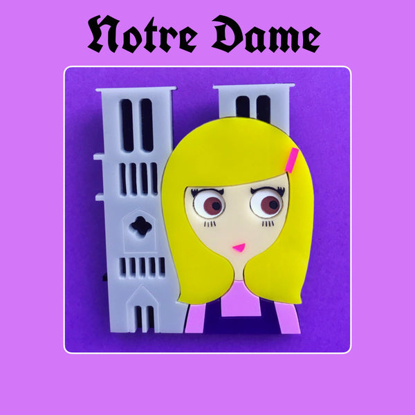 NOTRE-DAME Acrylic Brooch, Brown eyes blonde standing before Notre-Dame de Paris Cathedral - Isa Duval