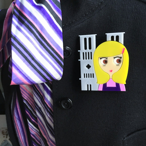 NOTRE-DAME Acrylic Brooch, Brown eyes blonde standing before Notre-Dame de Paris Cathedral - Isa Duval